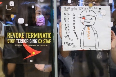 香港デモ、キャセイ航空で「魔女狩り」 密告におびえる従業員ら証言