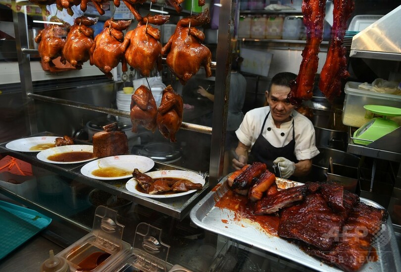 シンガポールの屋台食堂、ミシュラン星獲得で大繁盛